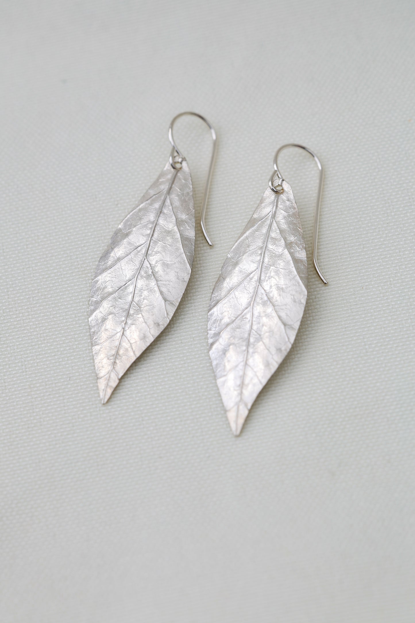 Textured sterling silver leaf earrings, Maine forest jewelry, hand carved dangle earrings