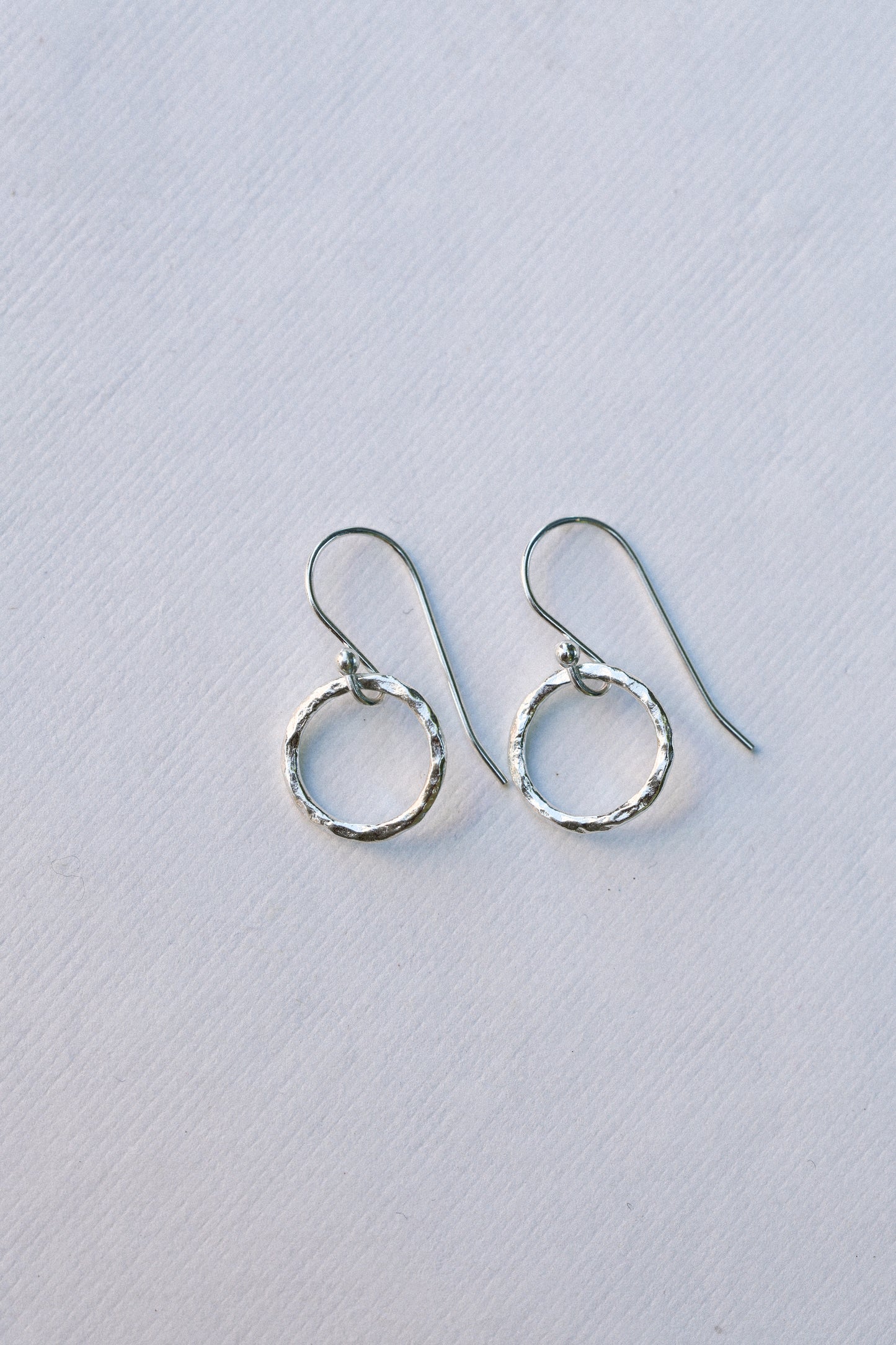 Small Simple Hammered Hoop Earrings in recycled silver