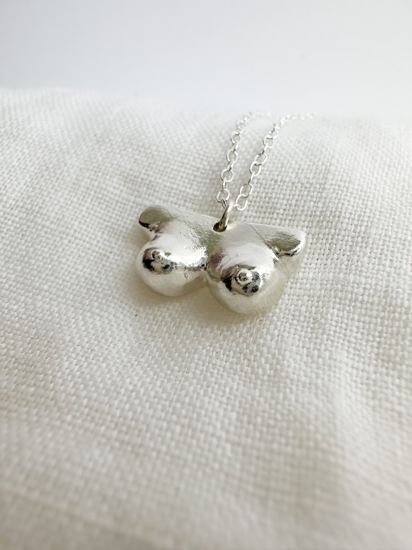 Boob necklace sterling silver breast necklace, hand-carved in Maine, adjustable chain, recycled silver