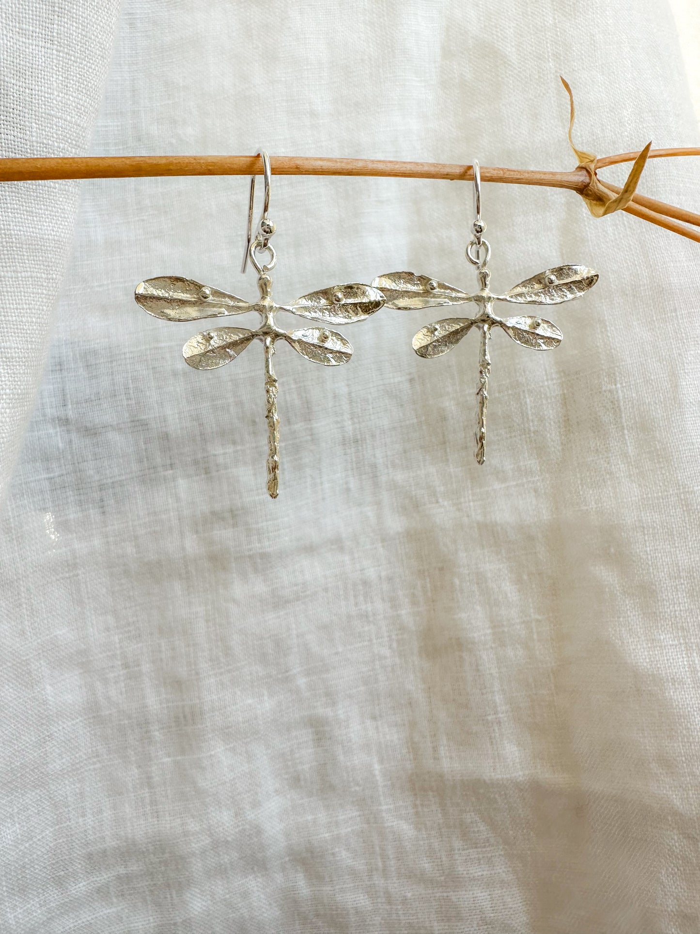 Dragonfly dangles lightweight and made in sterling silver or brass, lost wax cast