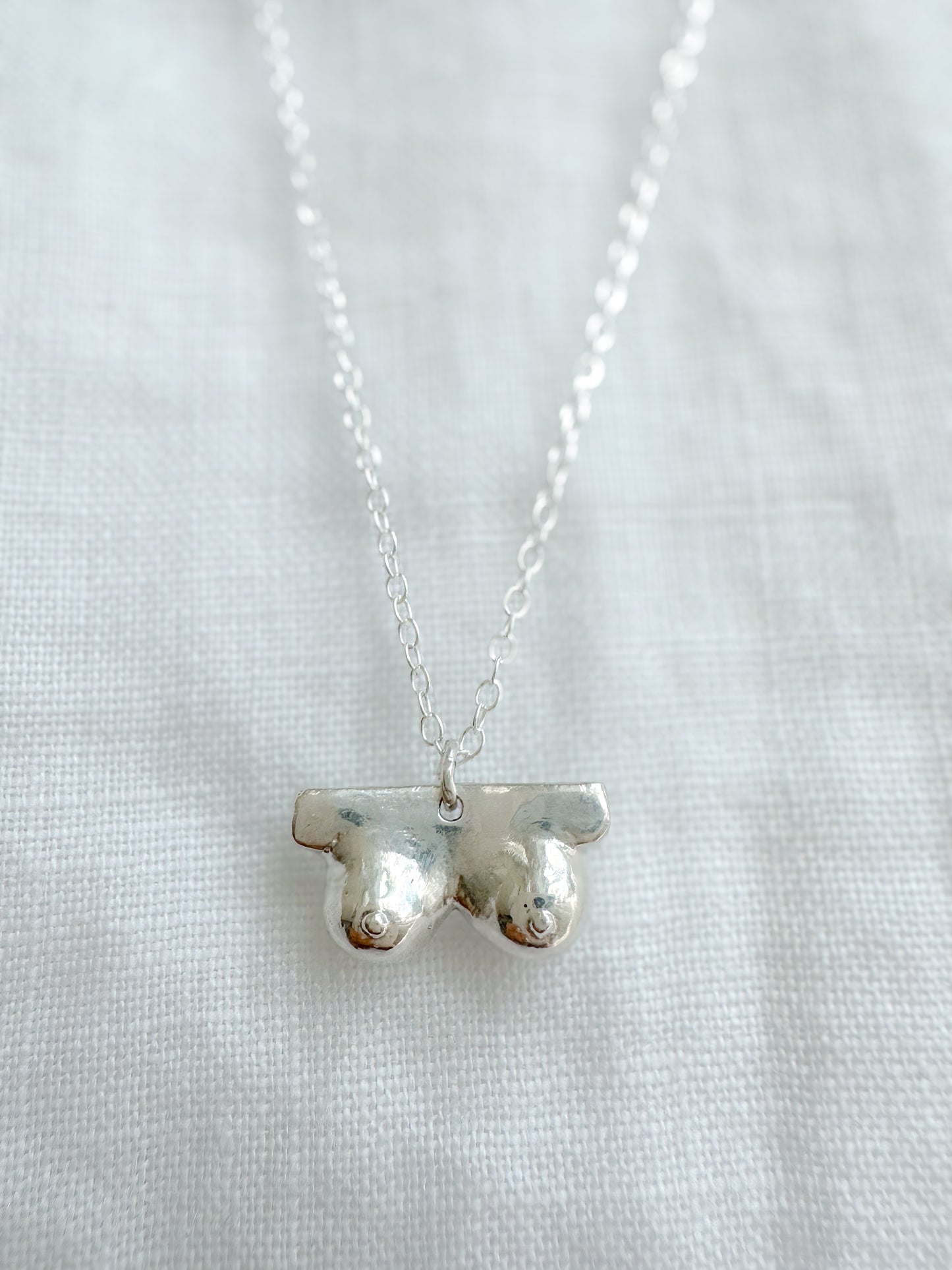 Boob necklace sterling silver breast necklace, hand-carved in Maine, adjustable chain, recycled silver