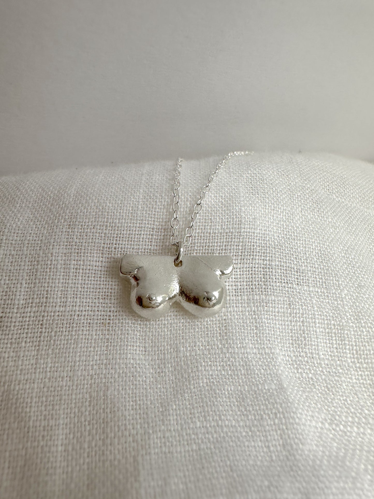 Boob necklace sterling silver breast necklace, hand-carved in Maine, adjustable chain, recycled silver