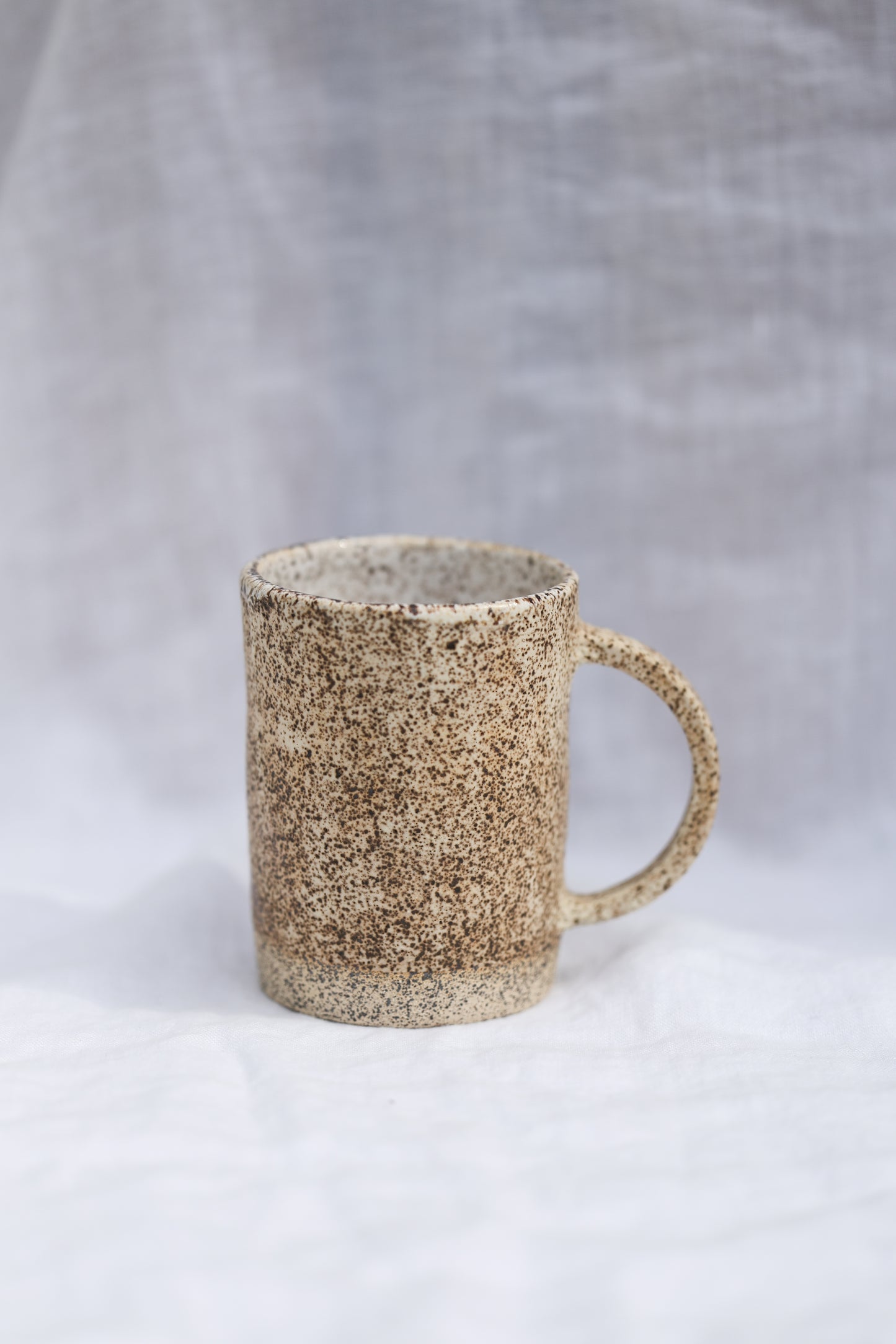 Small speckled stoneware mug