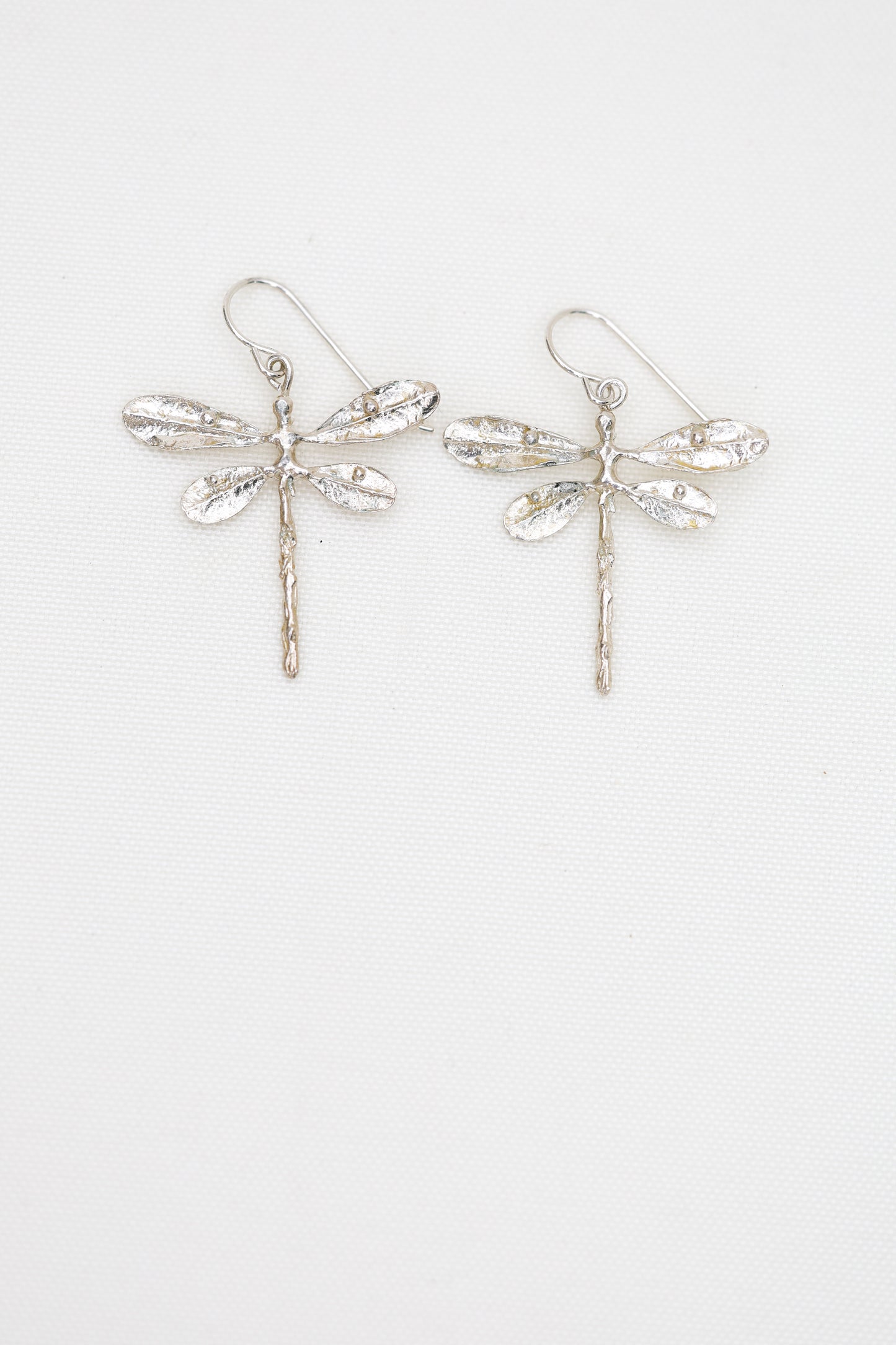 Dragonfly dangles lightweight and made in sterling silver or brass, lost wax cast