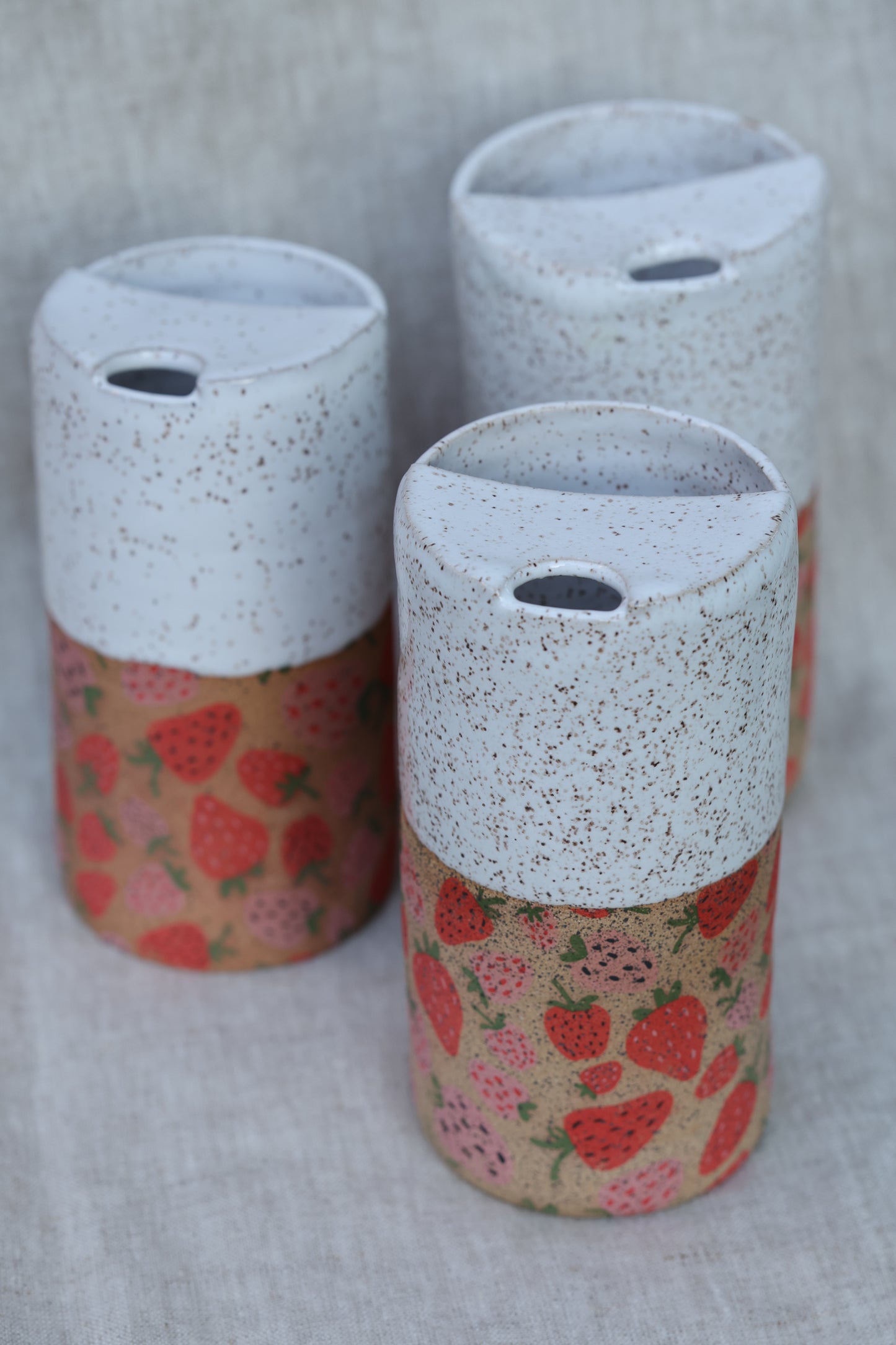 Strawberry travel mug in white with speckled clay - appx 12-14oz.