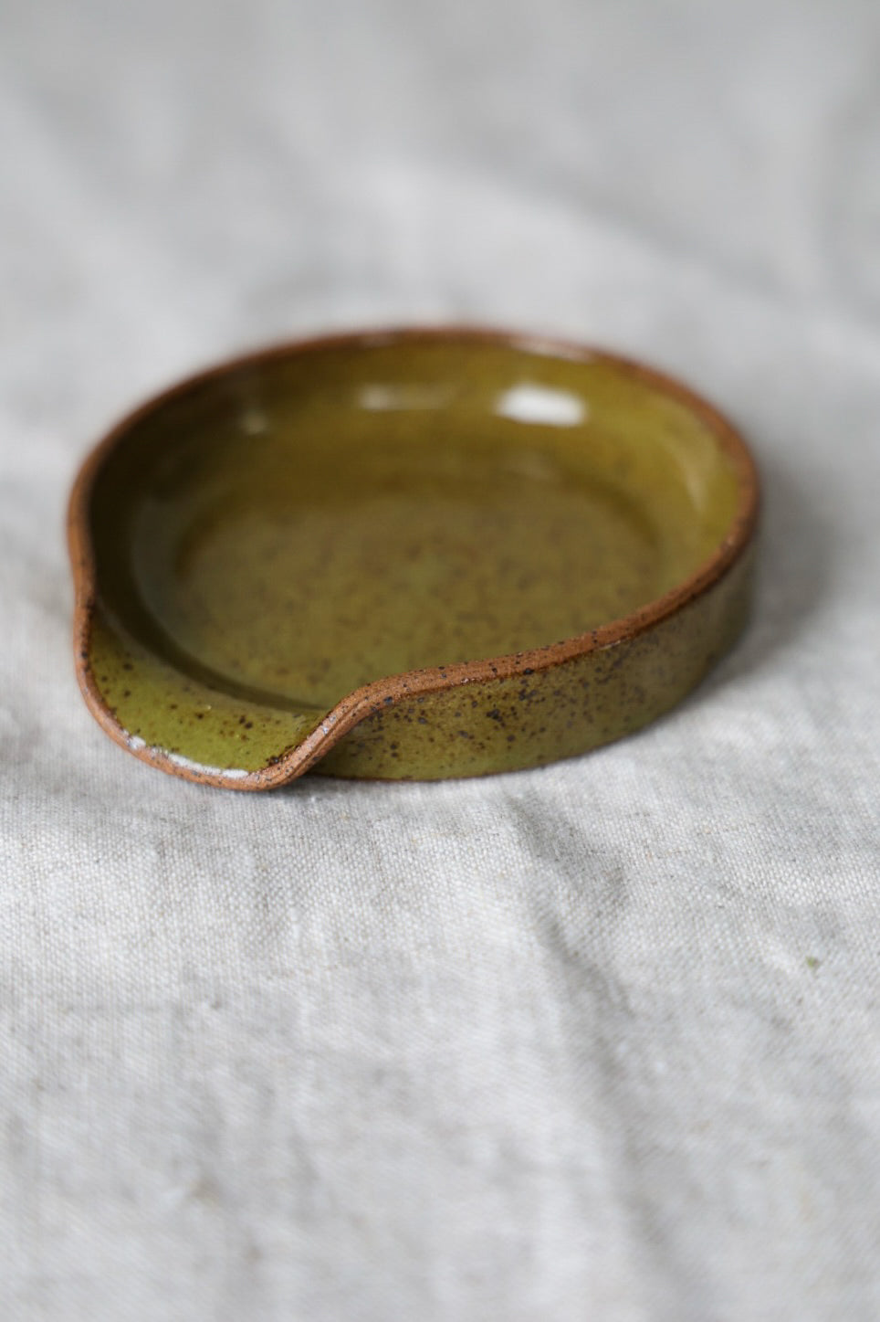 Spoon rest in speckled ceramic, kitchenware pottery, rustic, handmade, artful home, white, pink, or green.