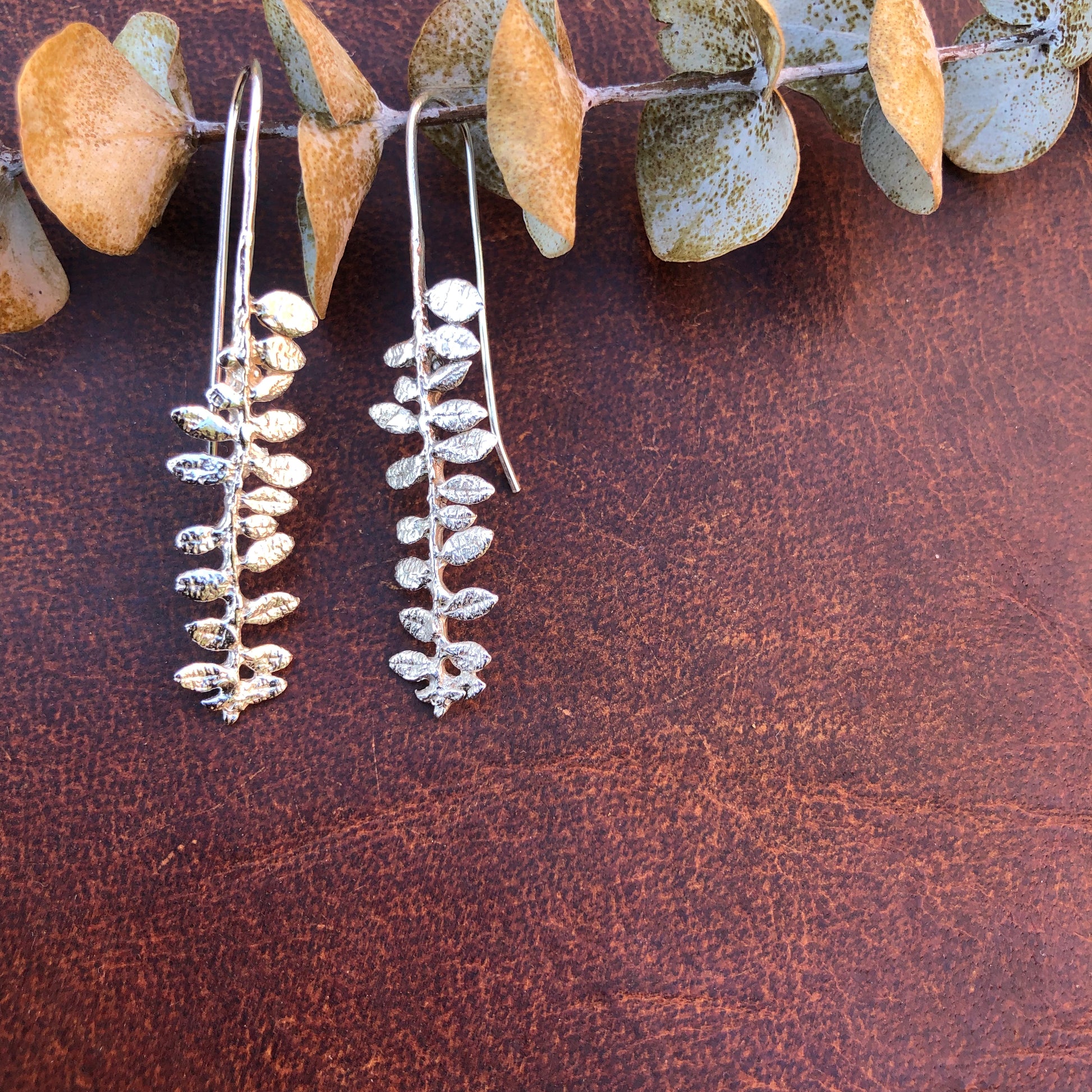Silver fern earrings hotsell