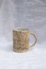 Small speckled stoneware mug
